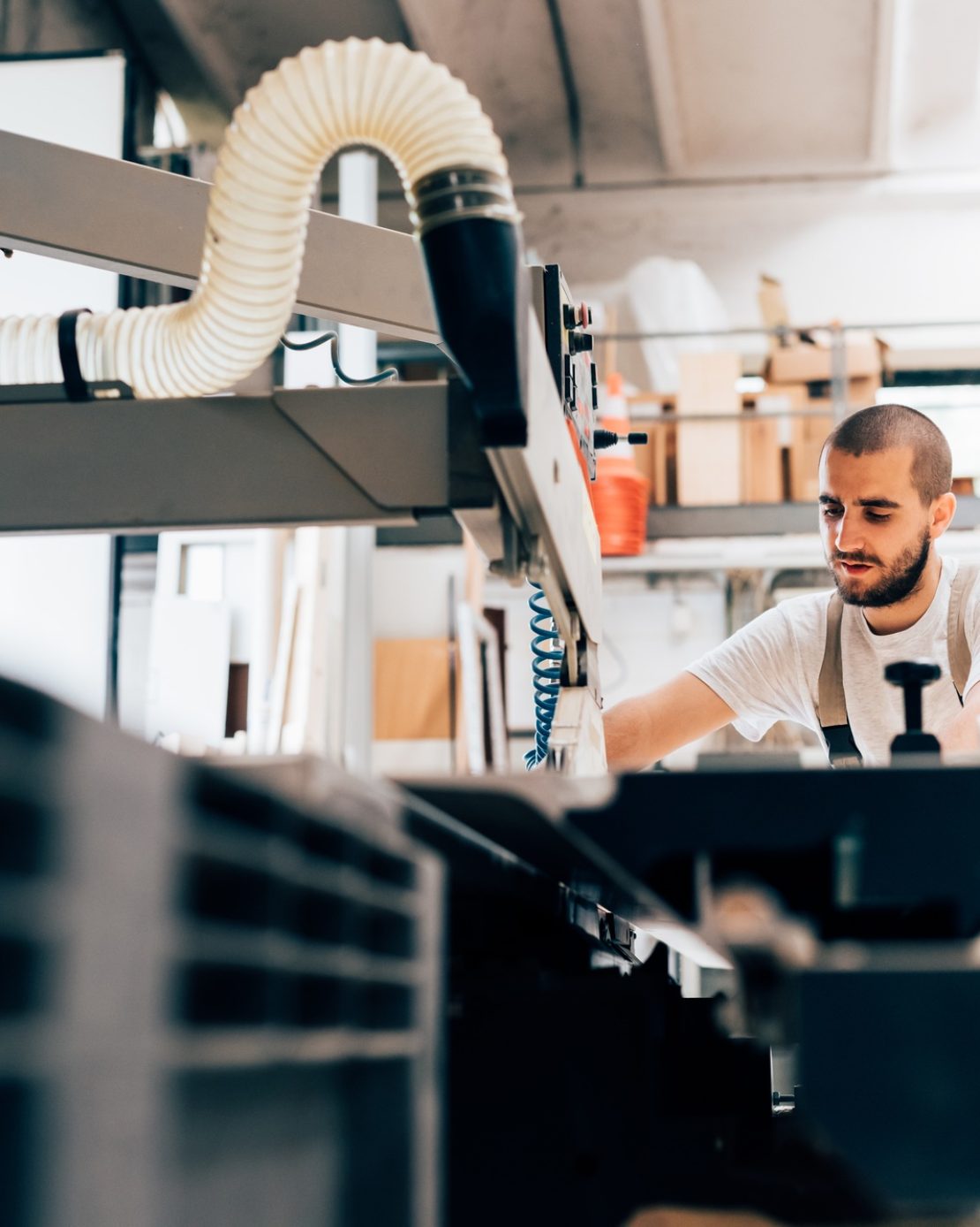 Carpenter working on machine